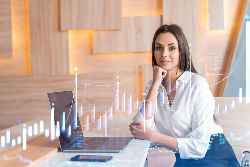 Mujer trader con gráfica de bolsa financiera